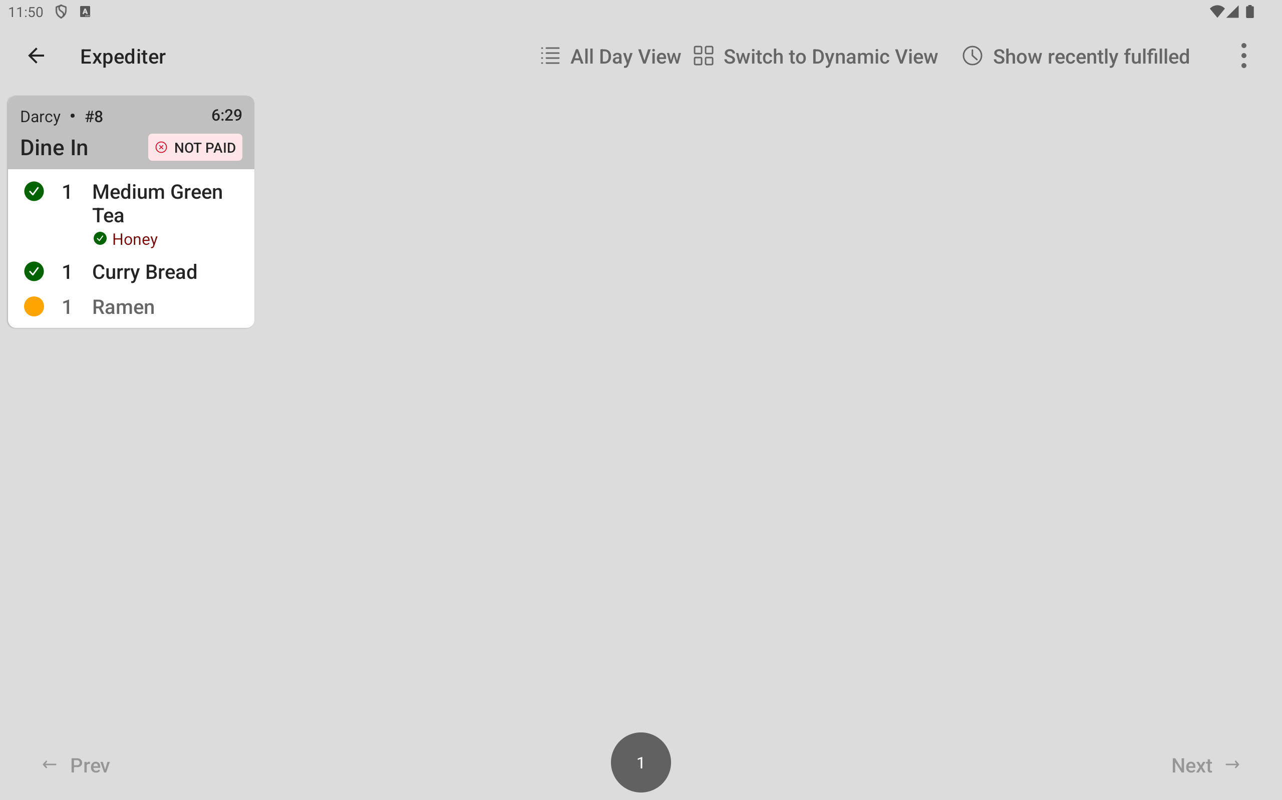 The expediter KDS device showing a ticket with a Food prep station item fulfilled.