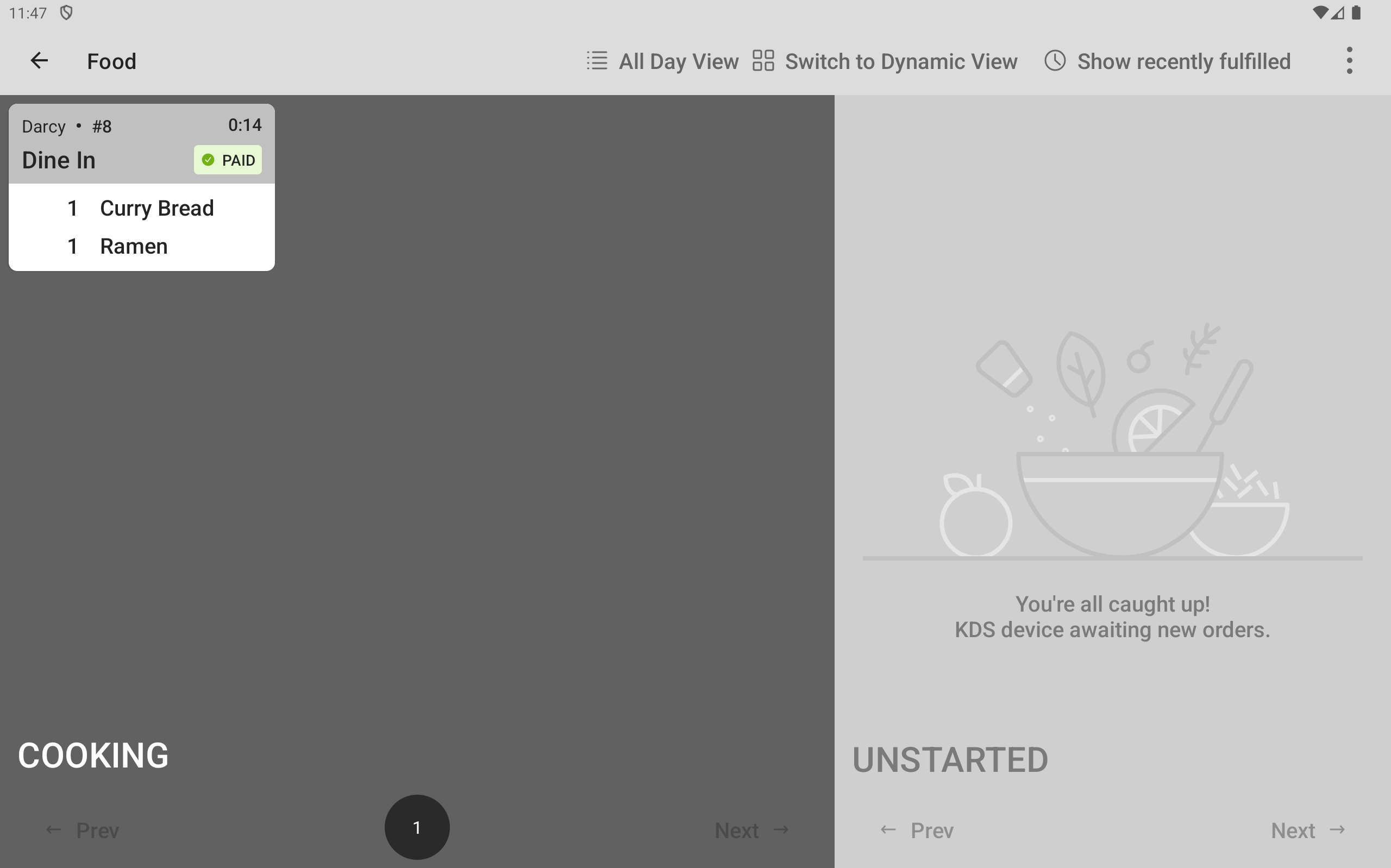 The Food prep station device showing a started ticket on the COOKING side of the screen.