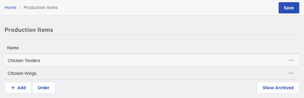 The Production Items page in Toast Web, with items set up for chicken tenders and chicken wings.